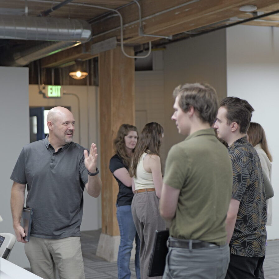 IntelliTect team in a discussion